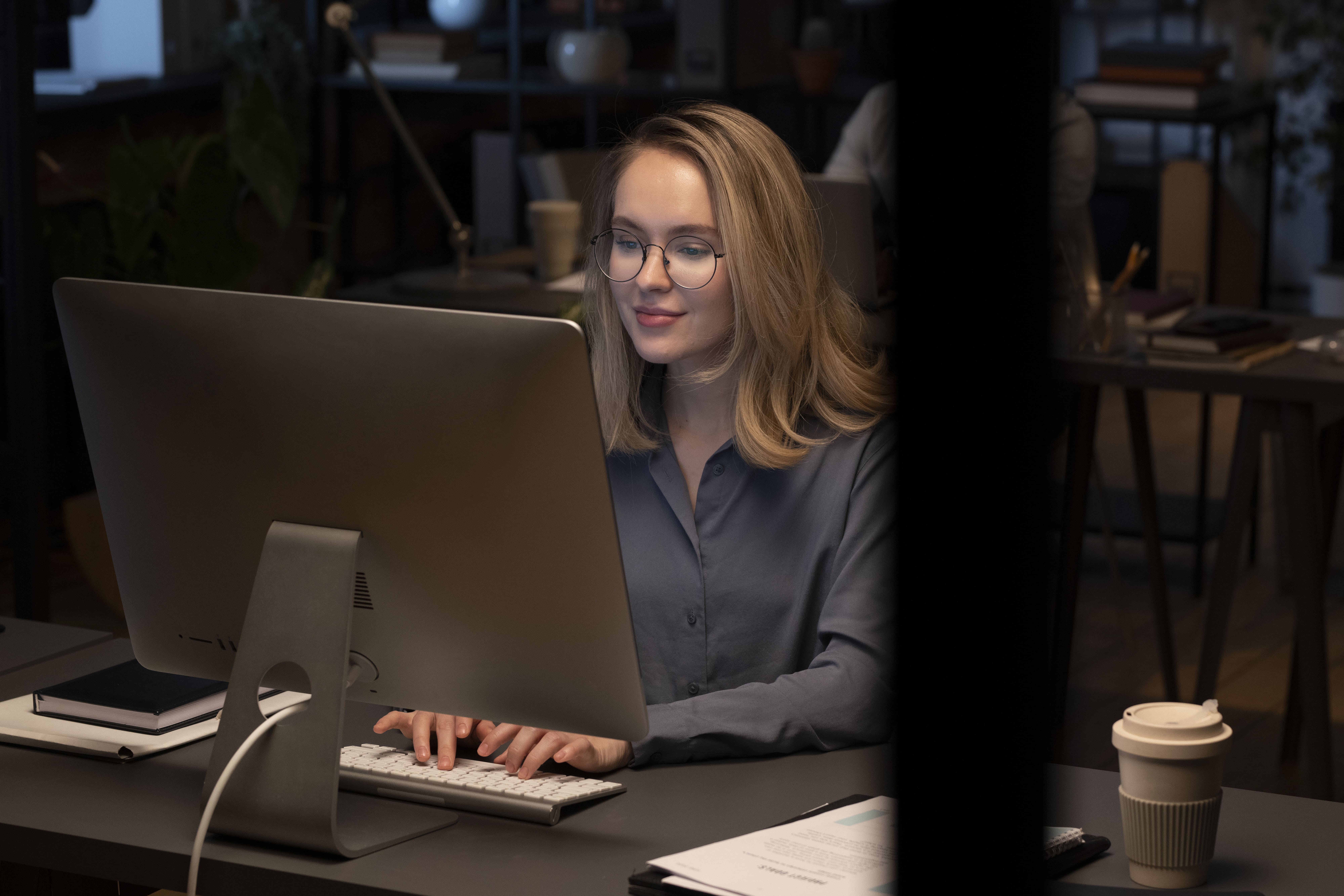 Operations professional working with business systems